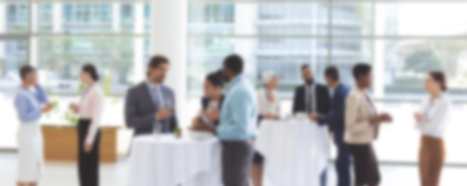 Blurred picture of people attending a professional networking event
