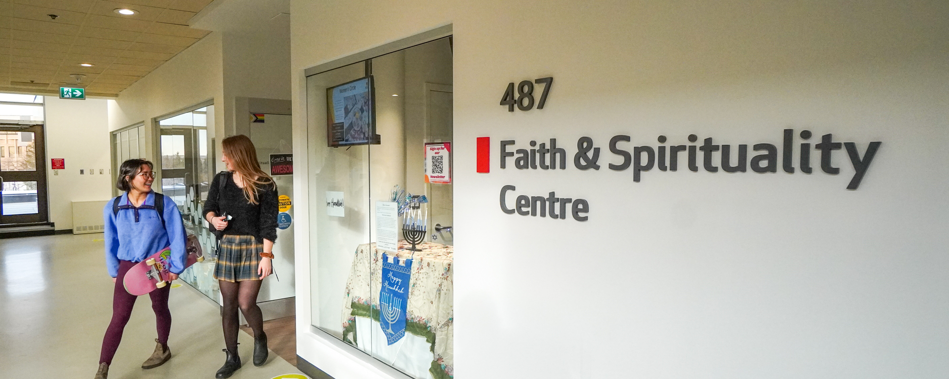 Students walking by the Faith & Spirituality Centre