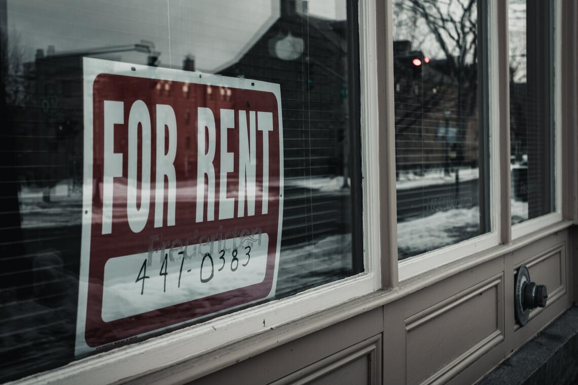 for rent sign displayed in a window