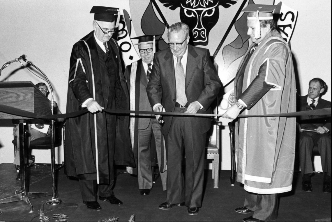 Carl O. Nickle cutting the ribbon to open the Nickle Arts Museum in 1978