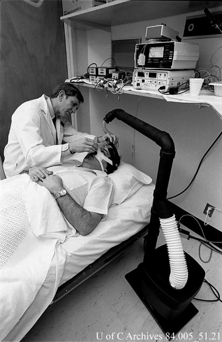 Heritage Fund researcher, Dr. John Remmers, with a patient wearing a "sleep mask" designed by Dr. Remmers, December 1985.