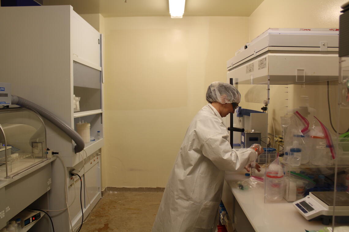 Anika Retzmann working in the clean room.