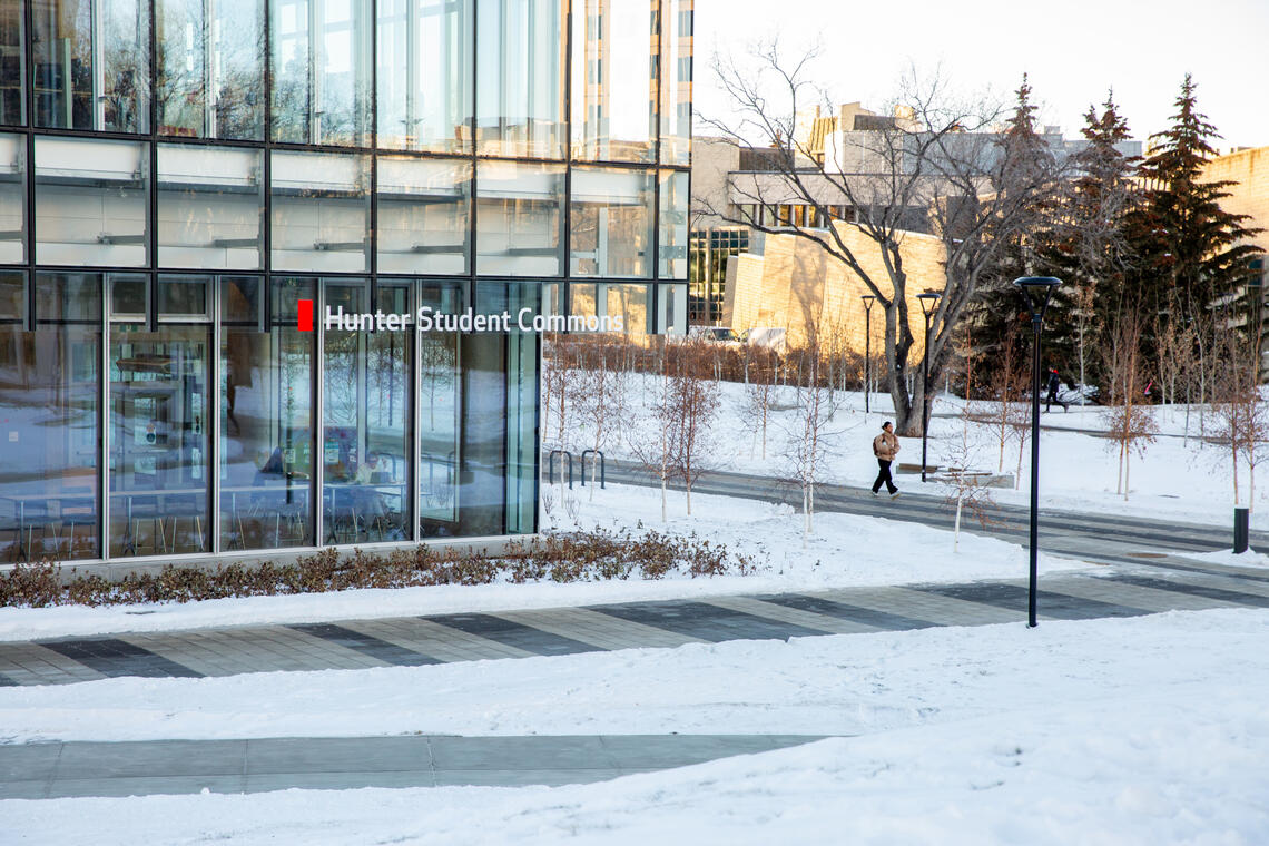 snowy walkway in front if the Hunter Student Commons