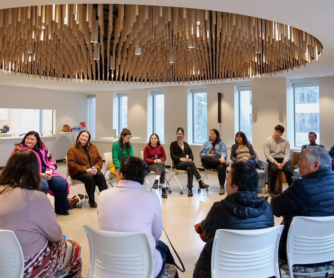 A group of people sitting in a circle