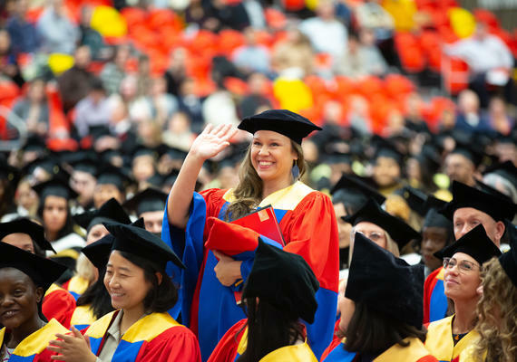 Smiling young woman at convocation