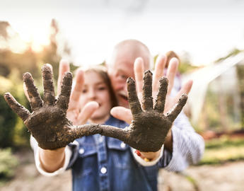kids with dirt on hands