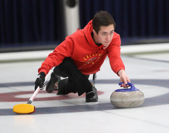 man on the curling rink